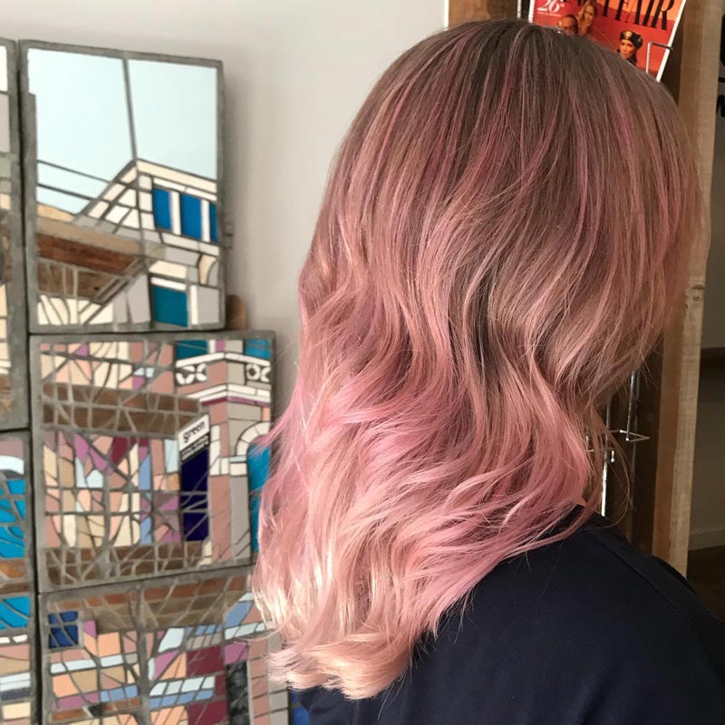 Babylights-hair-with-Pink-Toner-on-long-blond-hair